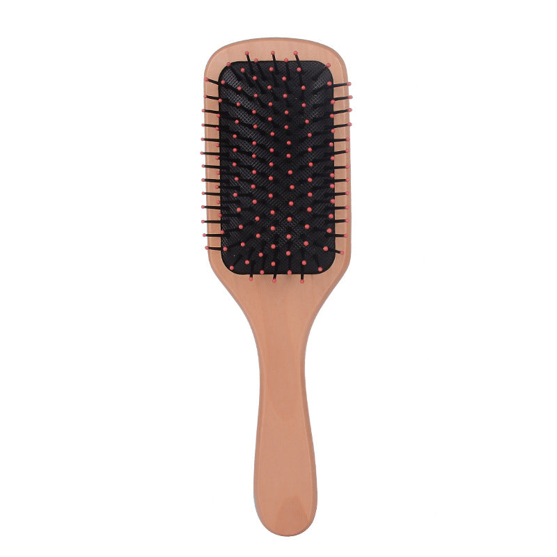 Wooden massage comb