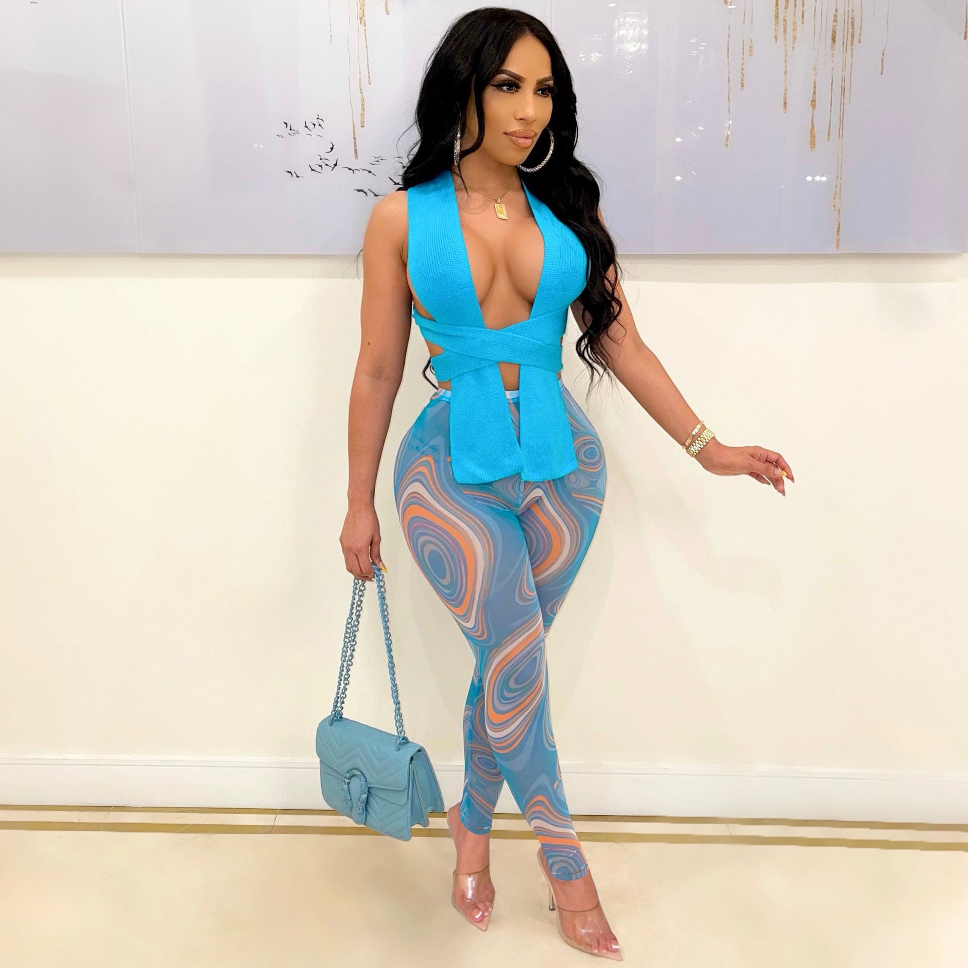 https://www.mydivinebeauty.biz/products/two-piece-halter-neck-wrap-print-trousers-set?utm_content=ios&utm_medium=product-links&utm_source=copyToPasteboard